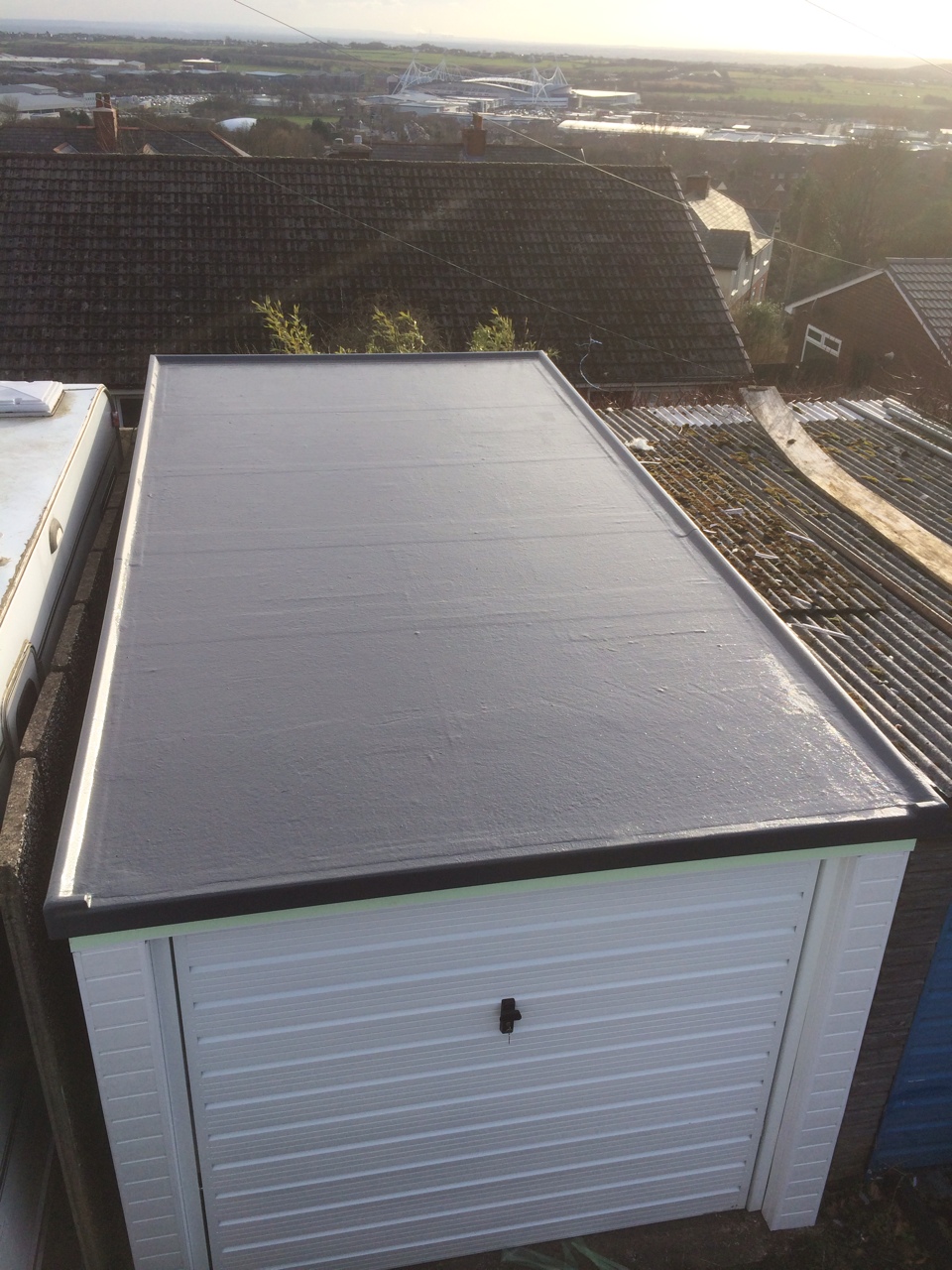 image shows grp roofing on a garage in sheffield